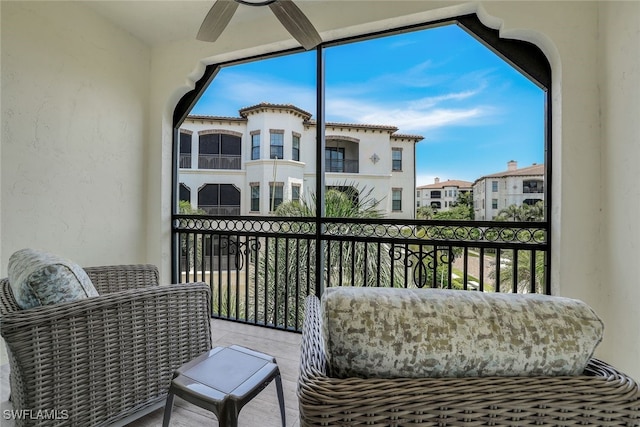 balcony featuring ceiling fan