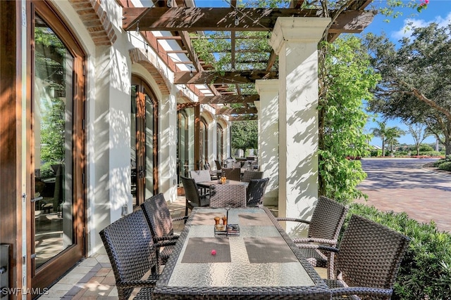 view of patio / terrace featuring an outdoor hangout area and a pergola