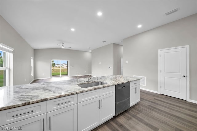 kitchen featuring dishwashing machine, ceiling fan, dark hardwood / wood-style flooring, sink, and vaulted ceiling