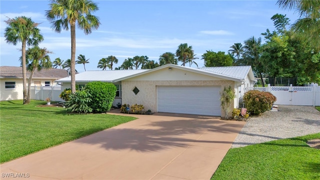 ranch-style house with a garage and a front lawn