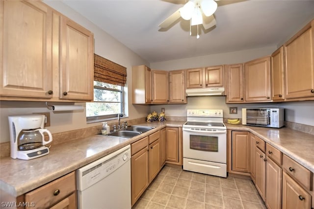 kitchen with white appliances, sink, light tile patterned floors, light brown cabinetry, and ceiling fan