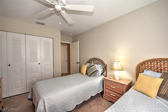 bedroom with a closet, carpet floors, and ceiling fan