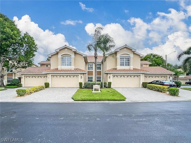 view of front of home with a garage