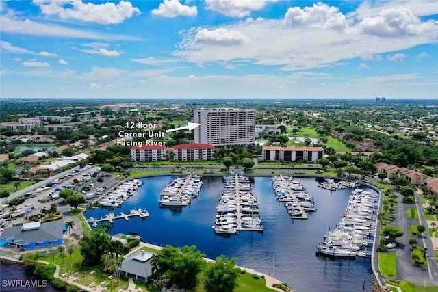 birds eye view of property featuring a water view