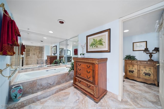 full bathroom with vanity, separate shower and tub, and toilet