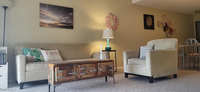 sitting room with carpet flooring