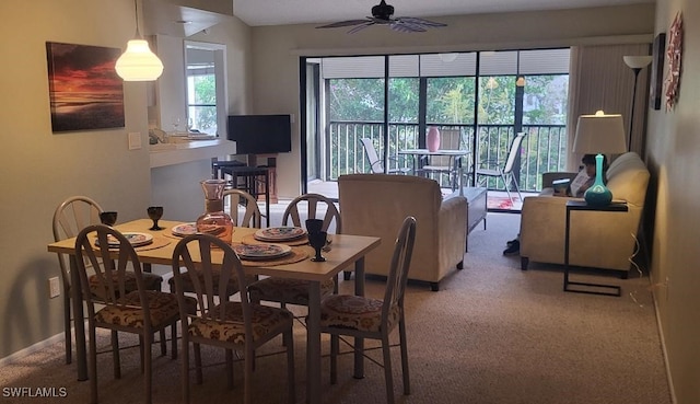 dining area featuring a healthy amount of sunlight and a ceiling fan