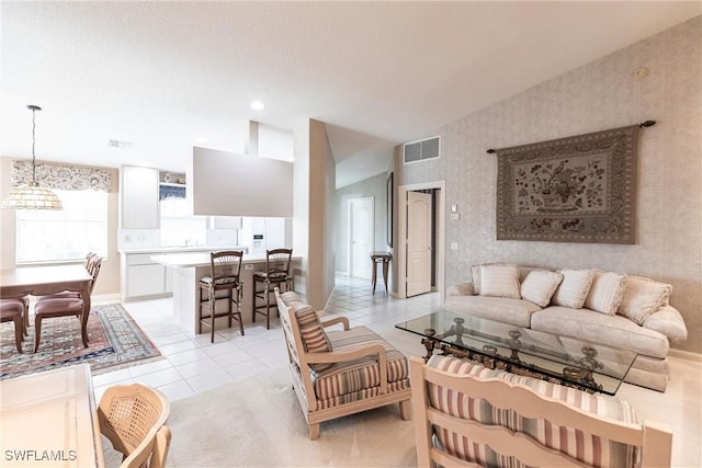 living room with light tile patterned floors