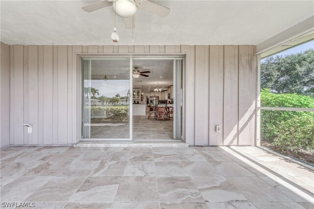 view of patio / terrace featuring ceiling fan