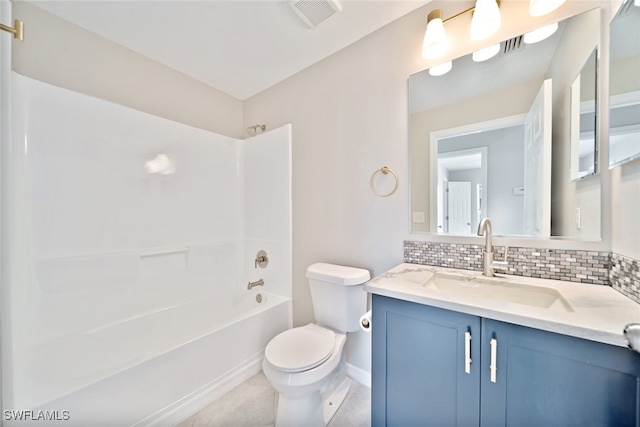 full bathroom featuring tasteful backsplash, vanity, toilet, and shower / washtub combination