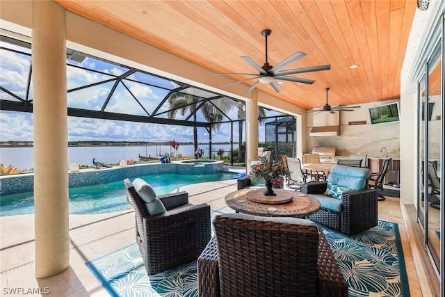 view of patio featuring a pool with hot tub, area for grilling, a water view, and glass enclosure