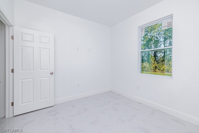 view of tiled spare room