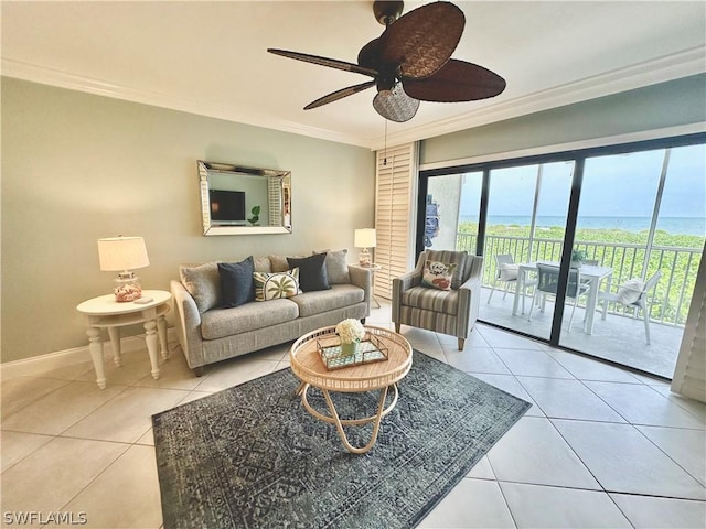 living room with crown molding, light tile patterned floors, and ceiling fan