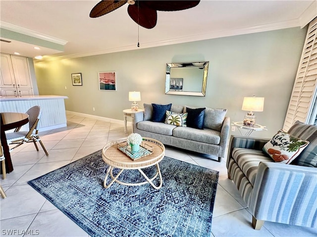 living room featuring light tile patterned flooring, ceiling fan, and ornamental molding