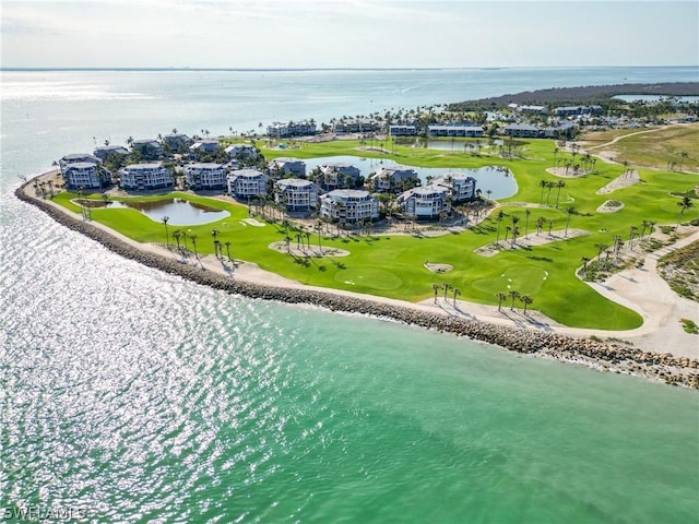 bird's eye view with a water view