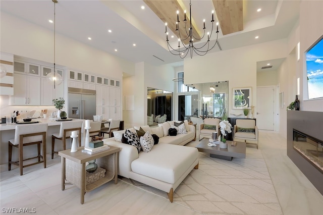 living room with a towering ceiling