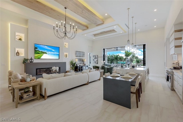 living room with a high ceiling, light tile patterned flooring, an inviting chandelier, and beam ceiling