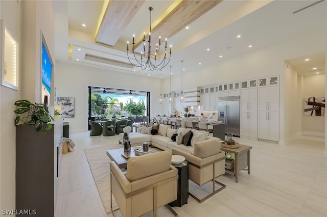 tiled living room with beam ceiling, a notable chandelier, and a towering ceiling