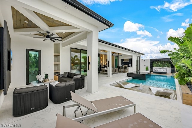 view of swimming pool featuring a patio, an outdoor hangout area, and ceiling fan