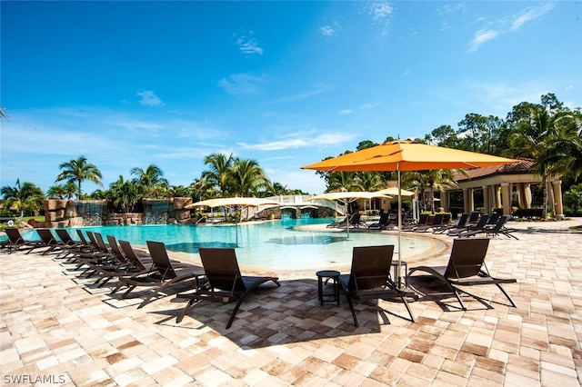 community pool featuring a patio area