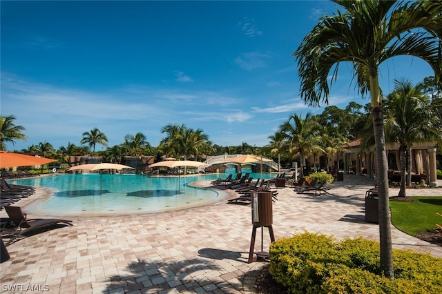 community pool with a patio