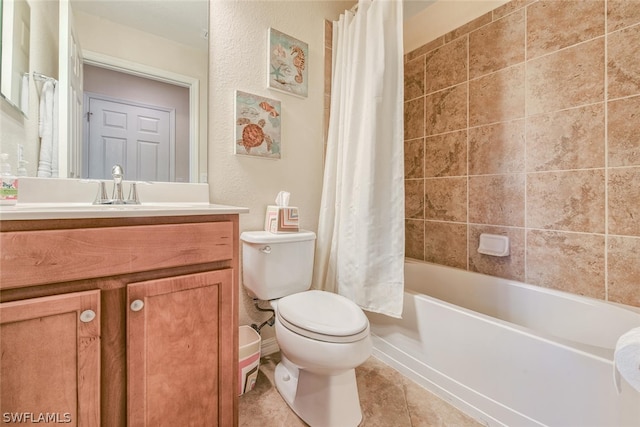 bathroom featuring toilet, tile patterned floors, shower / bath combination with curtain, and vanity