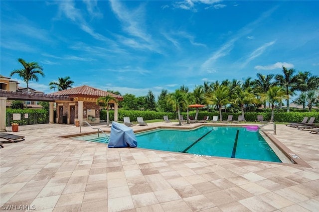 pool with a patio area