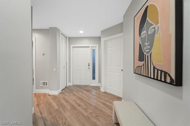 hallway featuring light wood-type flooring