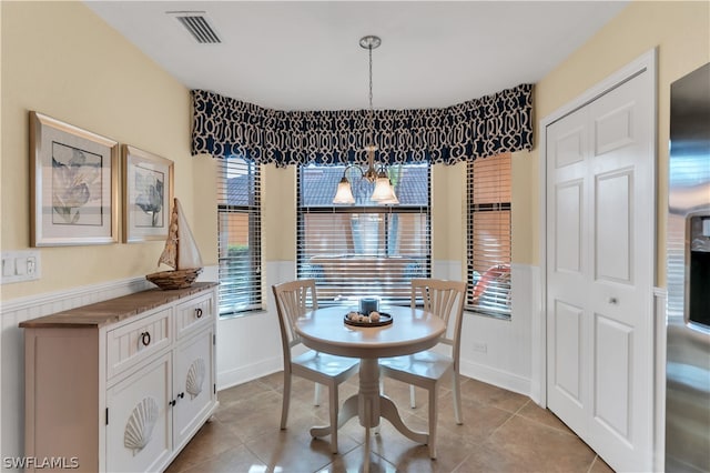 dining room with light tile patterned floors