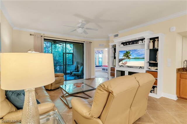 living room featuring crown molding, light tile patterned floors, and ceiling fan