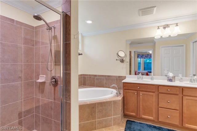 bathroom with tile patterned floors, ornamental molding, a shower with door, and dual bowl vanity