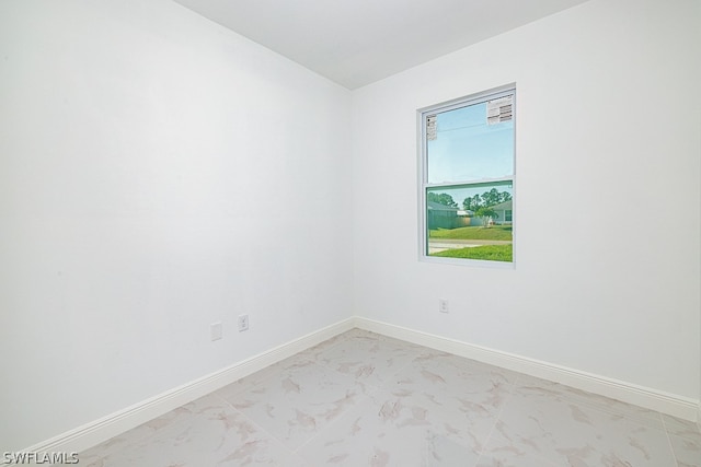 view of tiled spare room