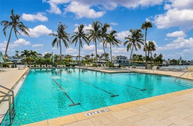 view of swimming pool featuring a patio