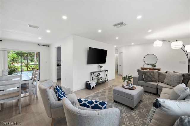 living room with hardwood / wood-style flooring