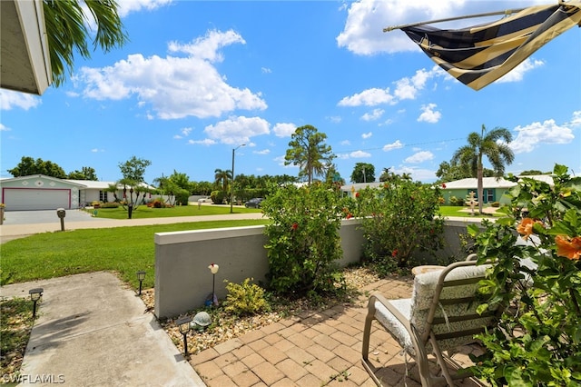 view of patio with a garage