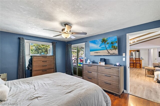 bedroom featuring hardwood / wood-style flooring and ceiling fan