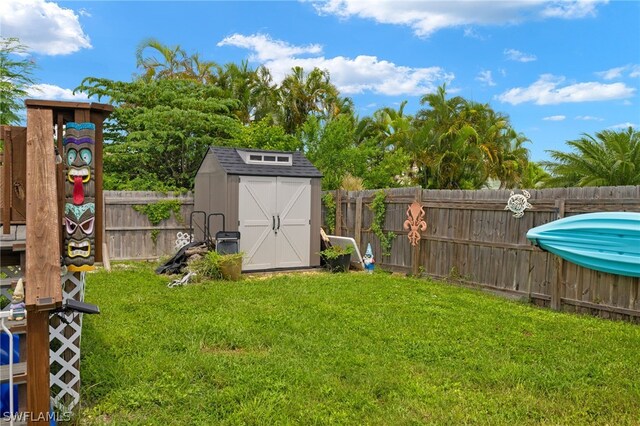 view of yard with a storage unit