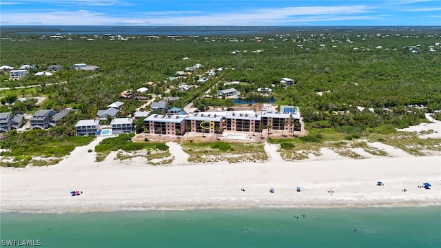 drone / aerial view with a view of the beach and a water view