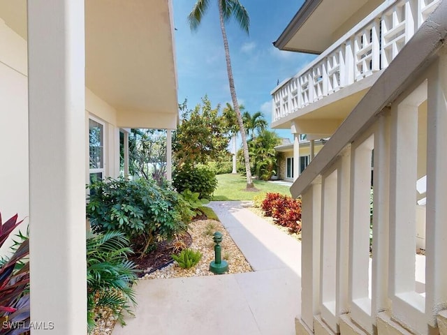 view of yard featuring a balcony