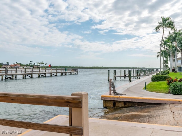 dock area featuring a water view