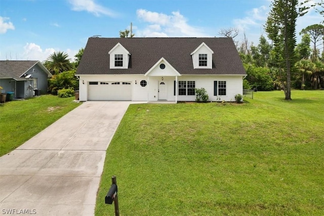 cape cod house with a garage and a front lawn