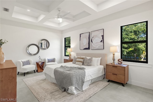 bedroom with coffered ceiling, light tile patterned floors, and ceiling fan