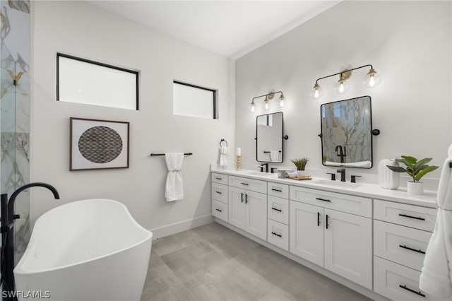 bathroom with double sink vanity and a tub to relax in