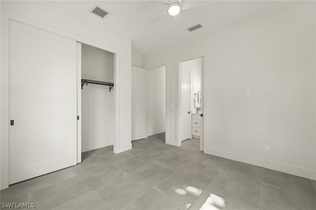 unfurnished bedroom featuring a closet, visible vents, ceiling fan, and baseboards