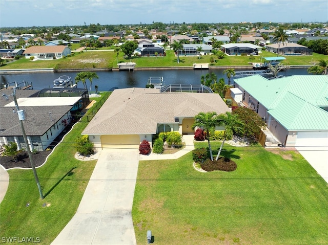 bird's eye view with a water view