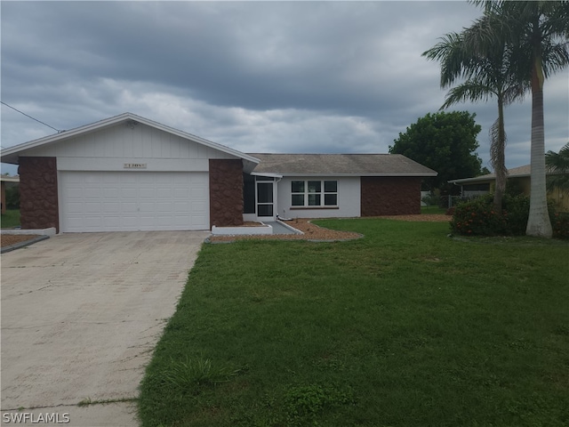 ranch-style home with a garage and a front yard