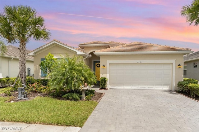 view of front of home featuring a garage