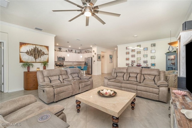 tiled living room with ceiling fan and ornamental molding