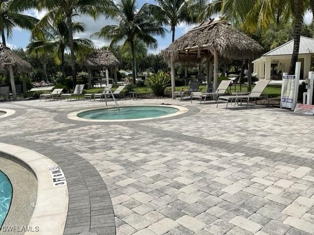 view of pool featuring a patio and a gazebo