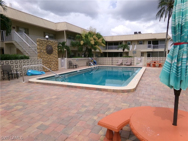 view of pool with a patio